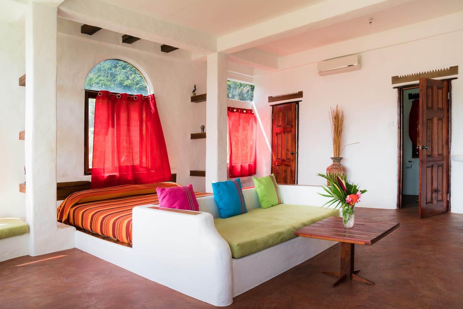 Villa entrance with palms