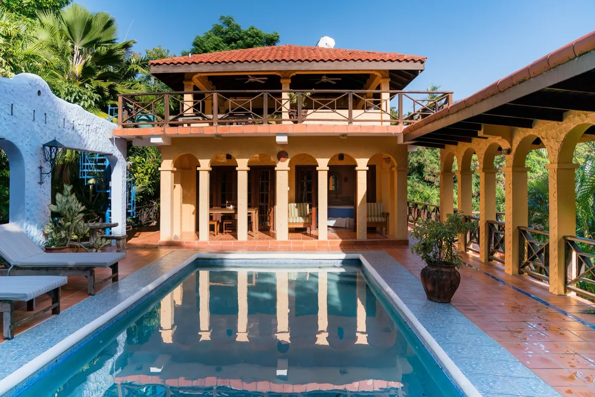 Reef View villa exterior with pool